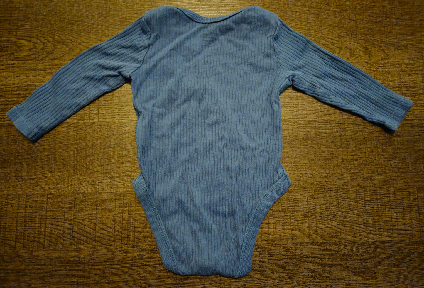 Blue Onesie With Long Sleeves
