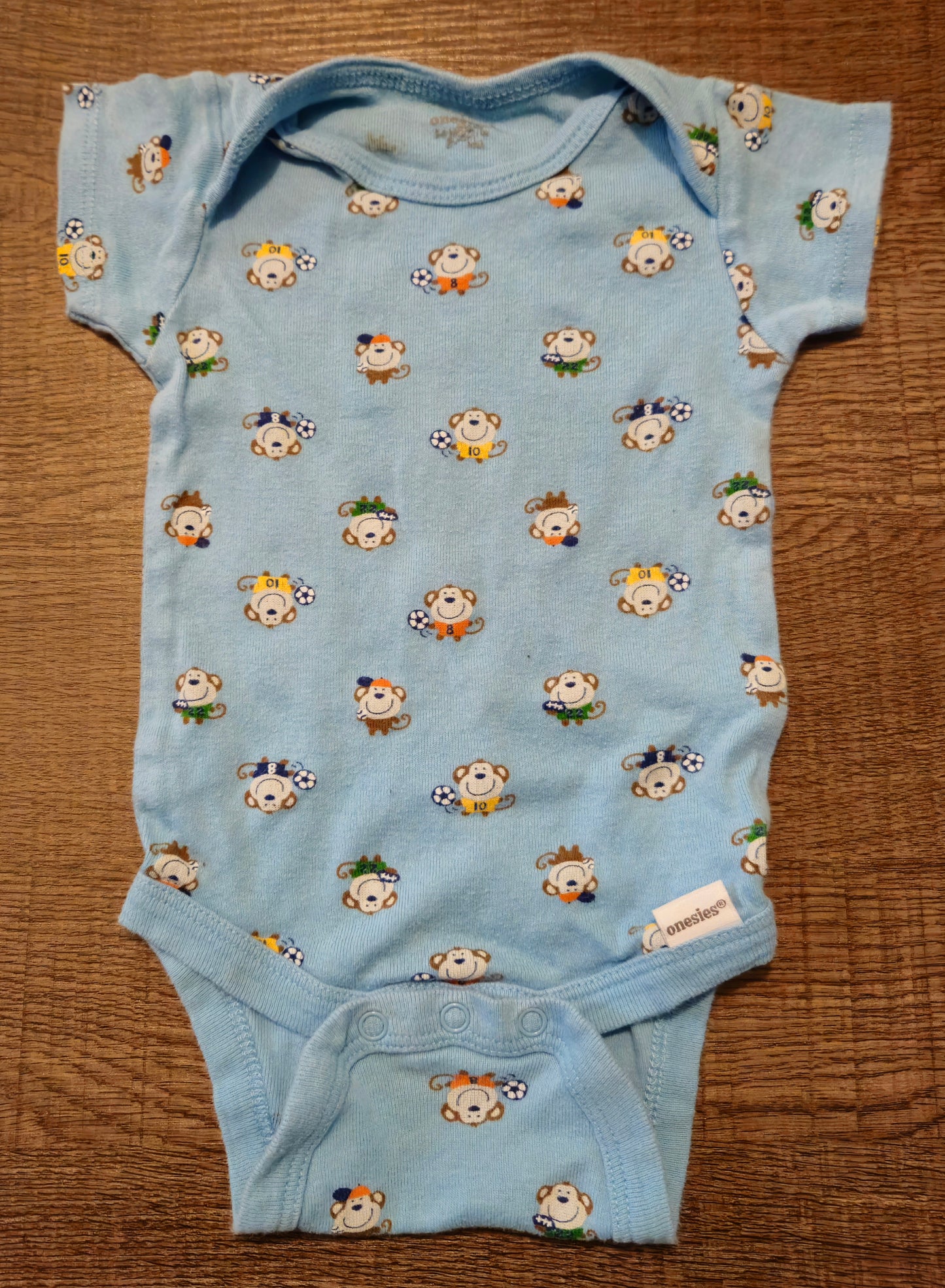 Blue Onesie With Little Monkeys