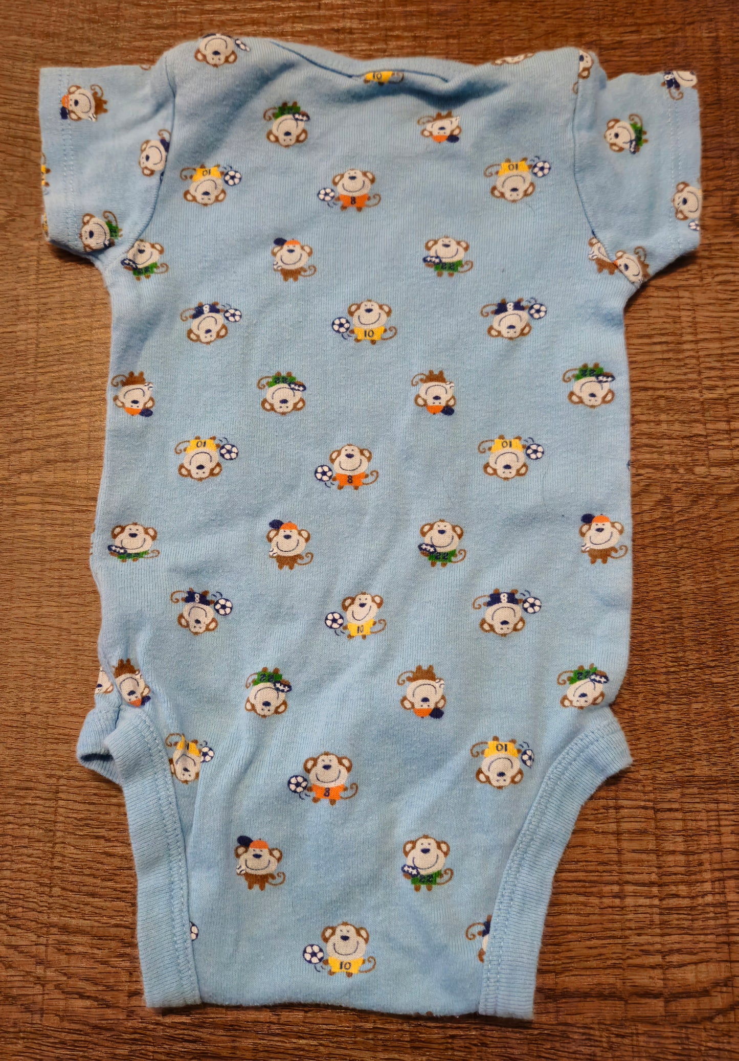 Blue Onesie With Little Monkeys