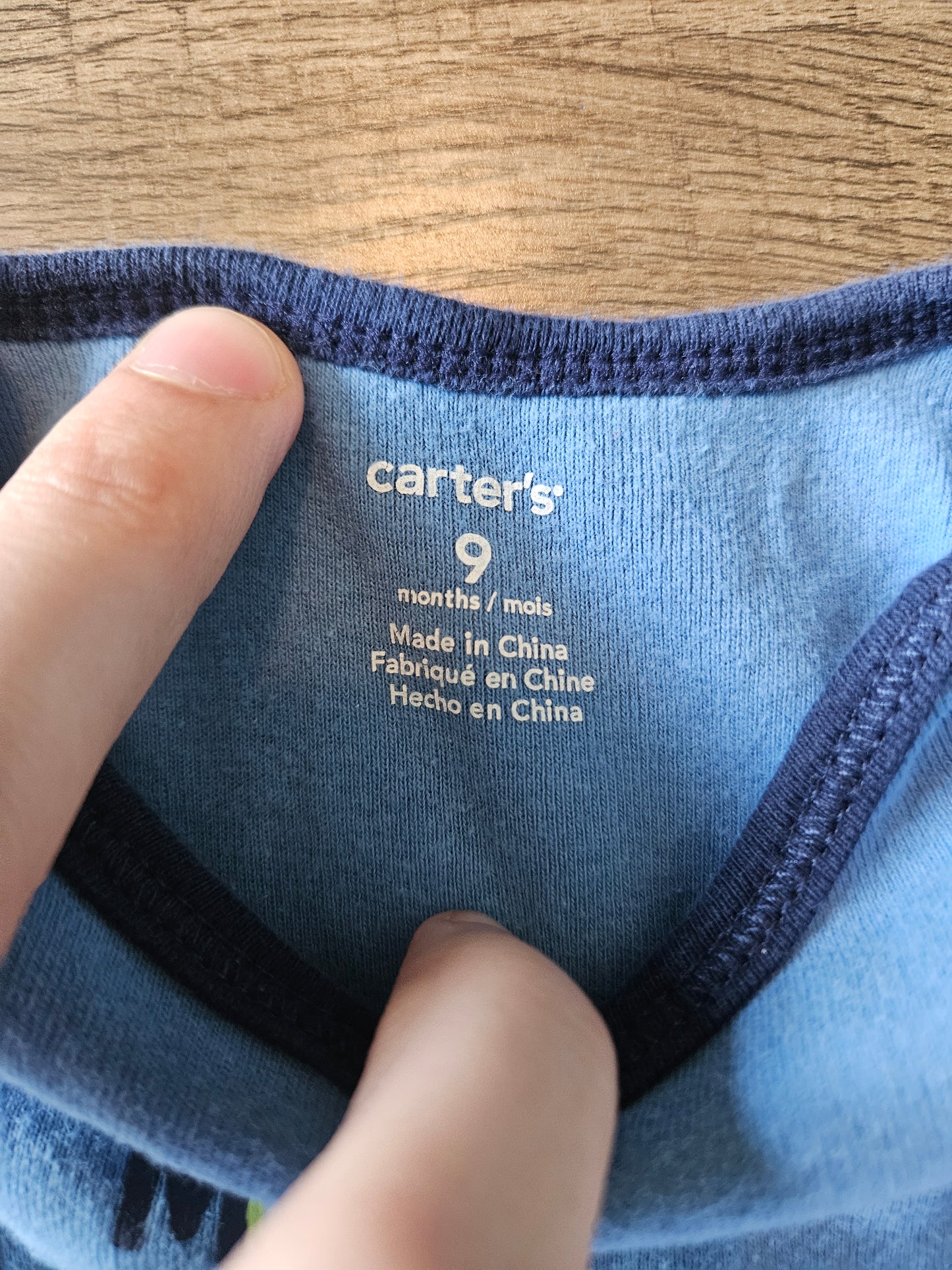 Blue Sleeper That Says "Daddy's Little Monster"
