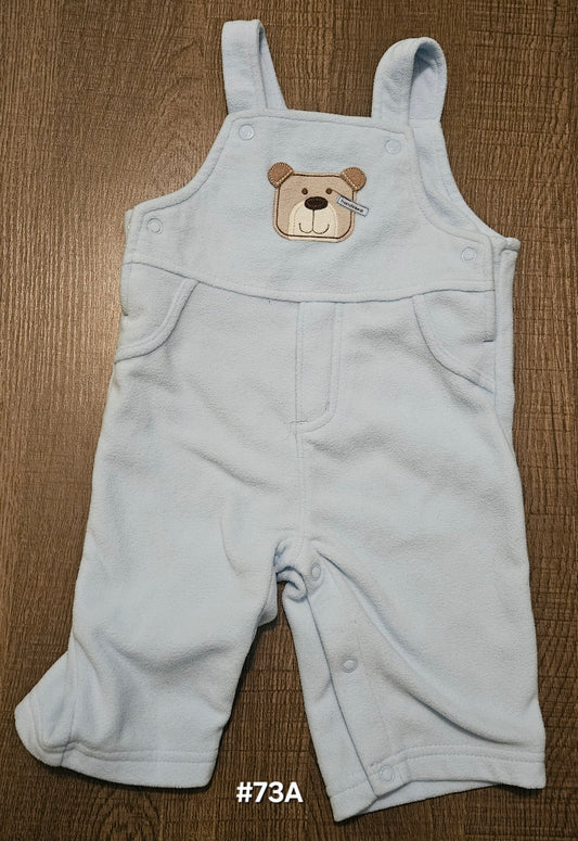 Blue Overalls With A Bear On Them