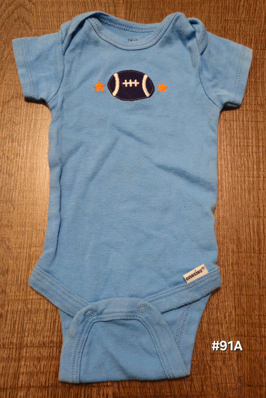 Blue Onesie With A Football On It