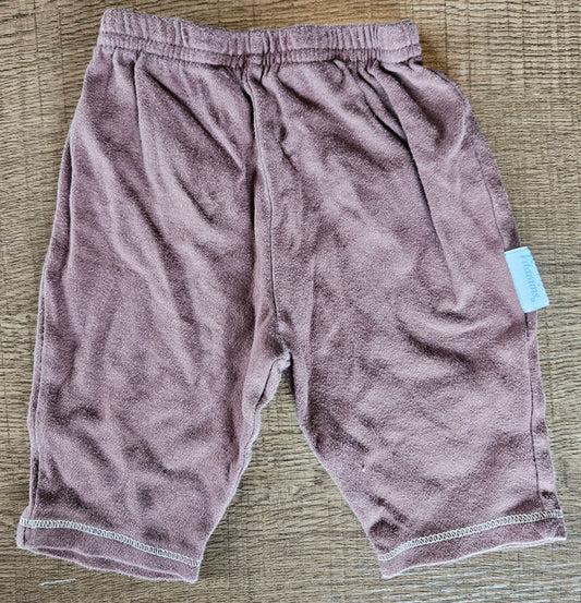 Brown Pants With Blue Shape On Them